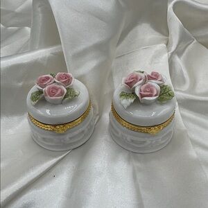 These are vintage JCPenney porcelain rose trinket boxes, like a wedding cake.